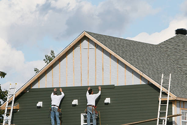 Professional Siding Installation technician working in Springfield, MN